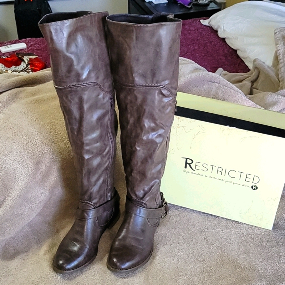Tall brown leather boots